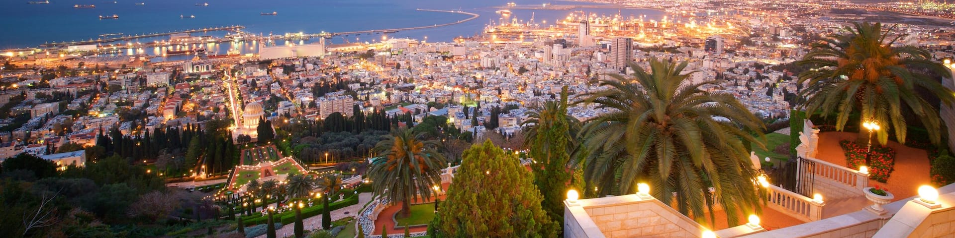 Haifa Port which includes a city, landscape views and a sunset