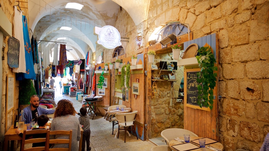 Turkish Bazaar featuring cafe lifestyle as well as a family