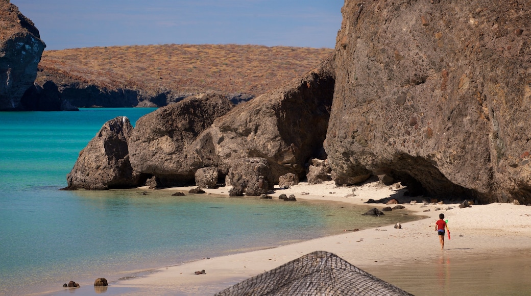 Balandra Beach featuring rugged coastline, a beach and general coastal views