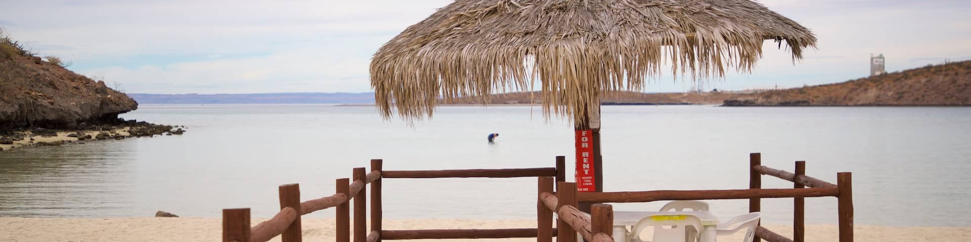 Tesoro Beach showing general coastal views, tropical scenes and a beach