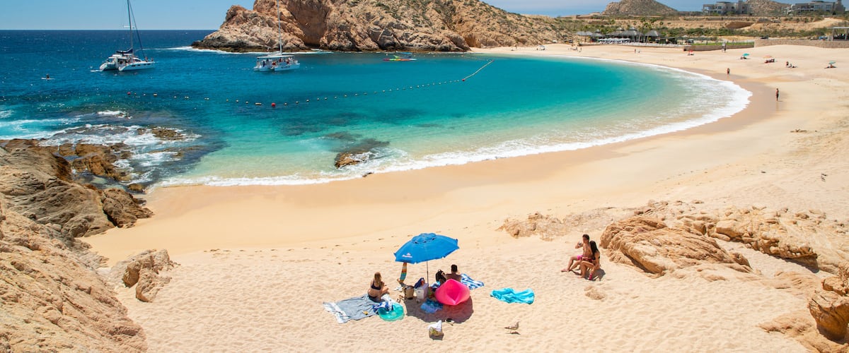 Santa Maria Beach featuring rocky coastline, a beach and general coastal views