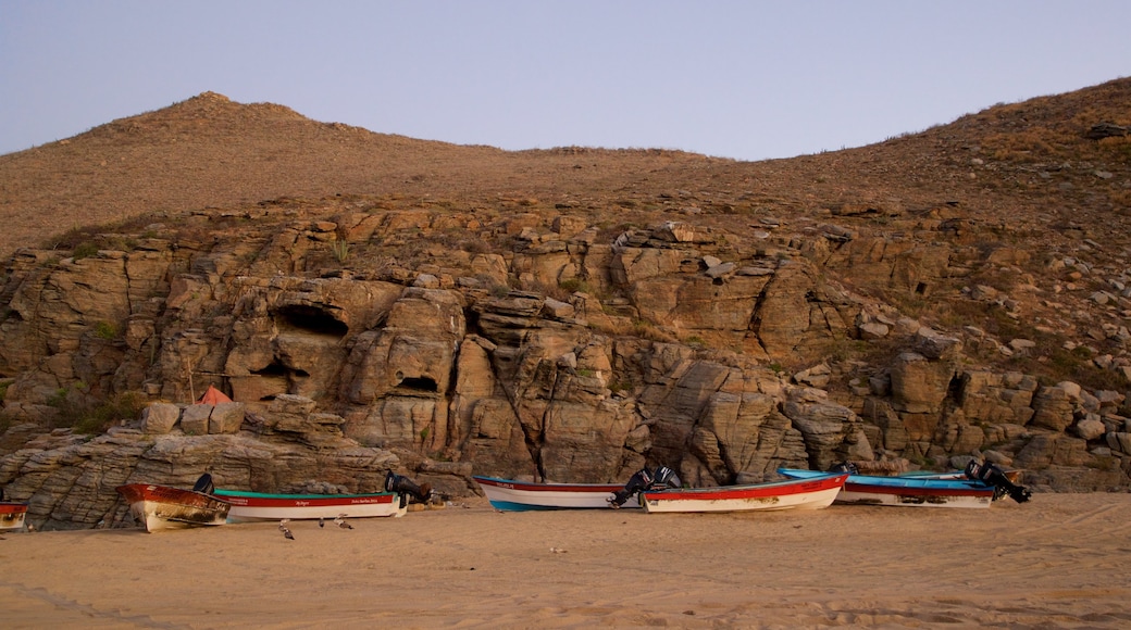 Punta Lobos featuring a beach and rocky coastline