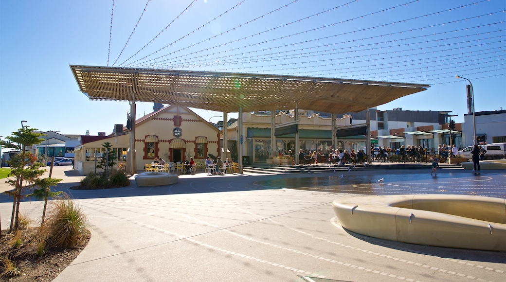 Henley Beach showing a sunset and a square or plaza