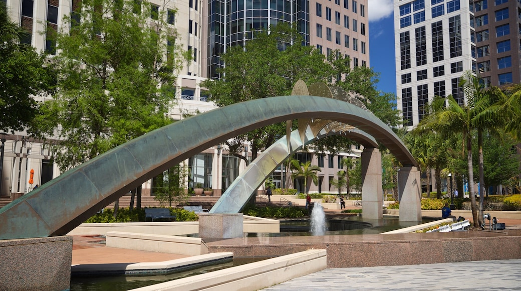 Orlando City Hall featuring a city, outdoor art and a fountain