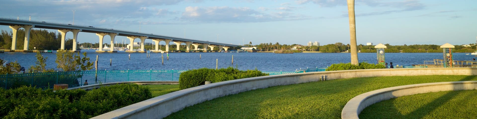 Royal Palm Pointe Park showing a garden and a river or creek