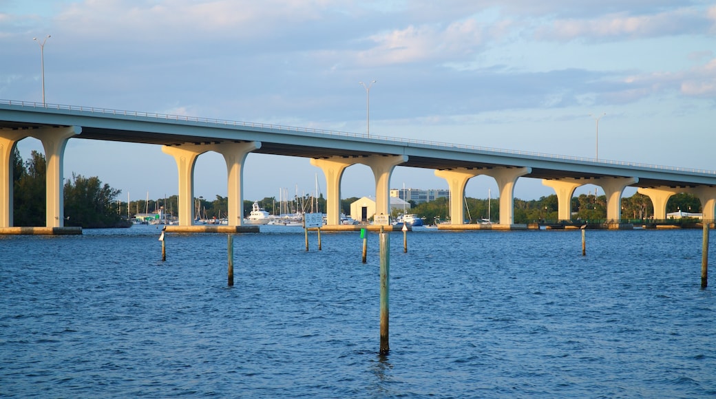 Royal Palm Pointe Park featuring a river or creek and a bridge