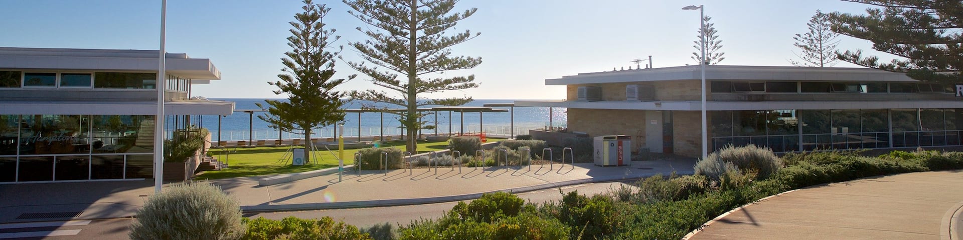 City Beach showing a coastal town and a sunset