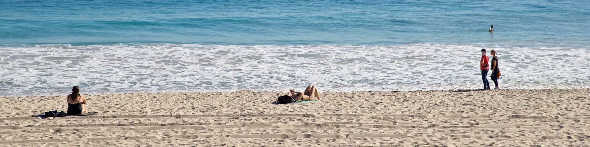 Scarborough Beach which includes a sandy beach and general coastal views