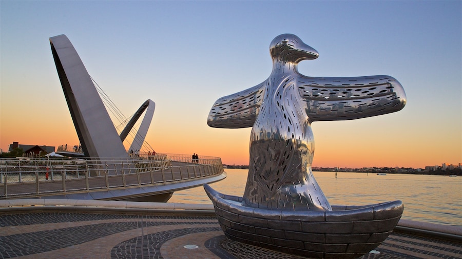 Elizabeth Quay which includes a sunset, outdoor art and general coastal views