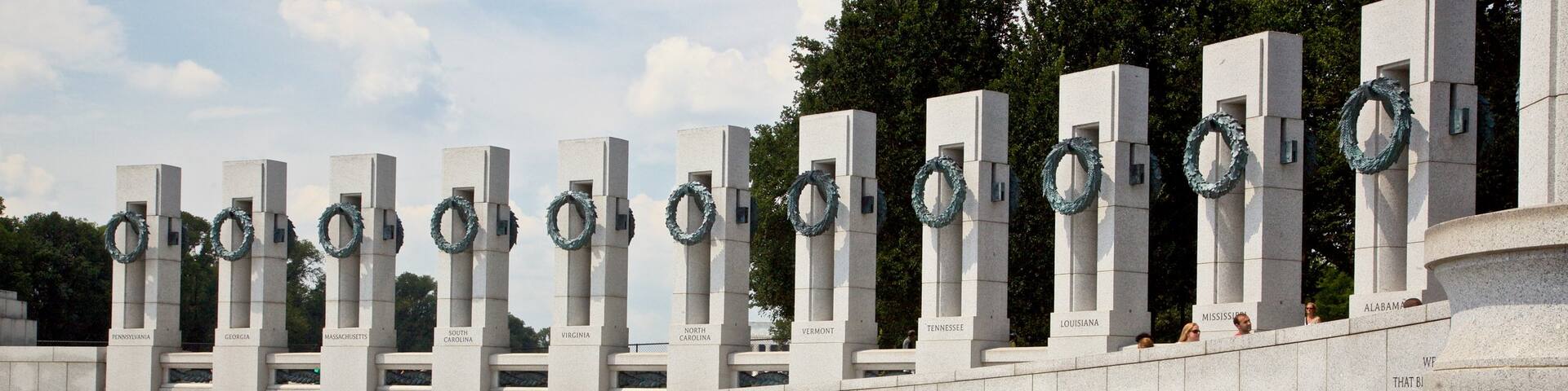 National World War II Memorial which includes a fountain as well as a small group of people