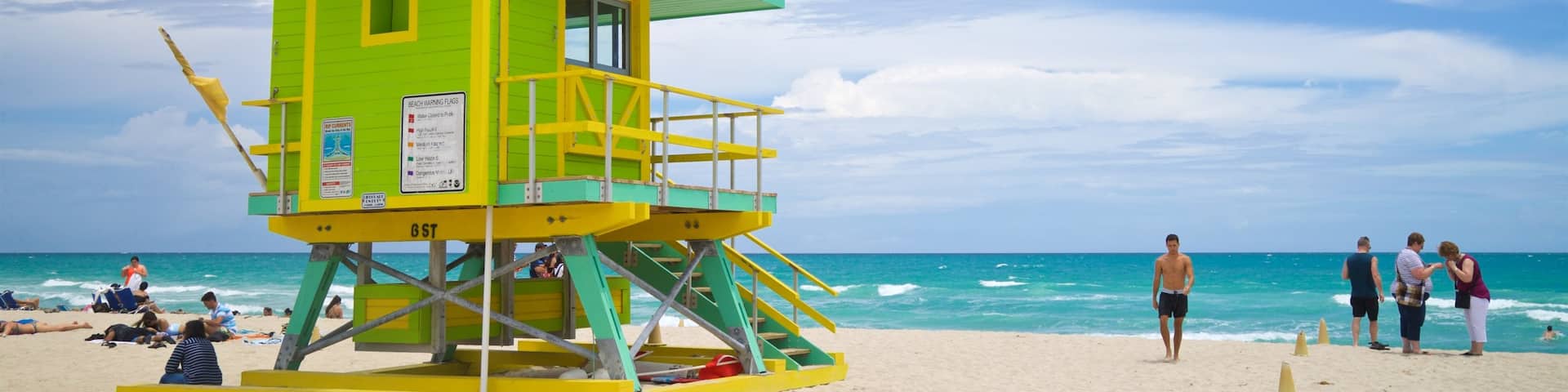 Lummus Park Beach featuring general coastal views and a beach as well as an individual male