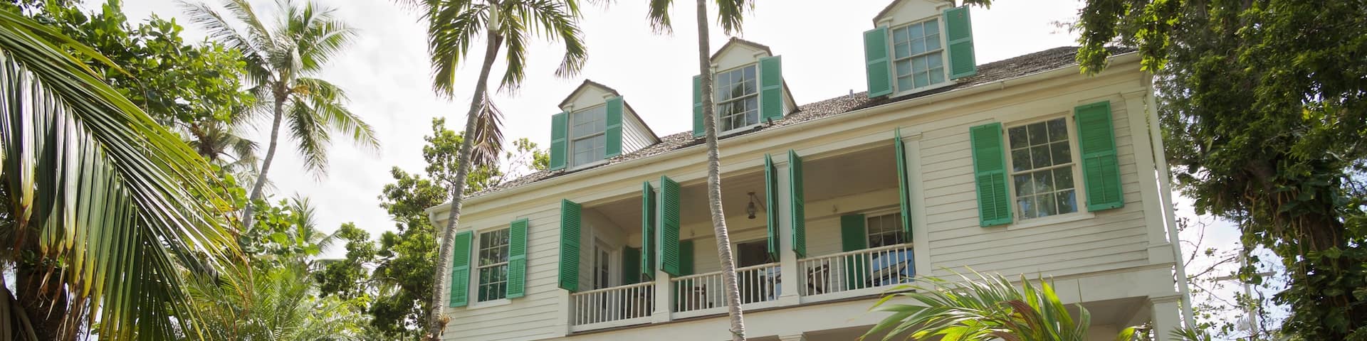 Audubon House and Tropical Gardens featuring a house