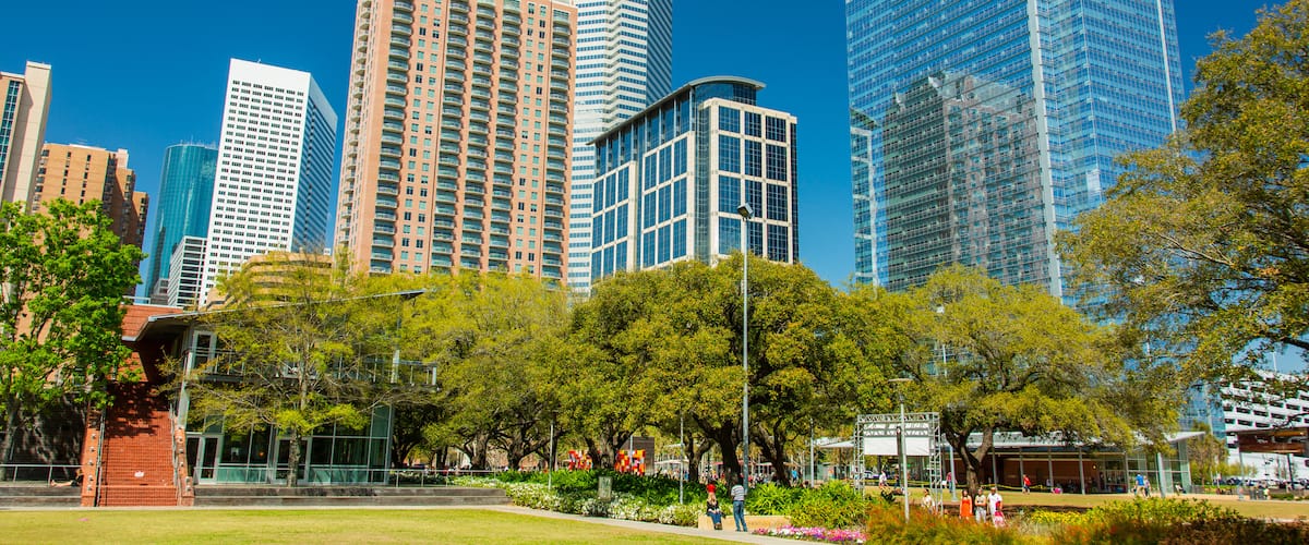 Discovery Green featuring a high-rise building, a city and modern architecture