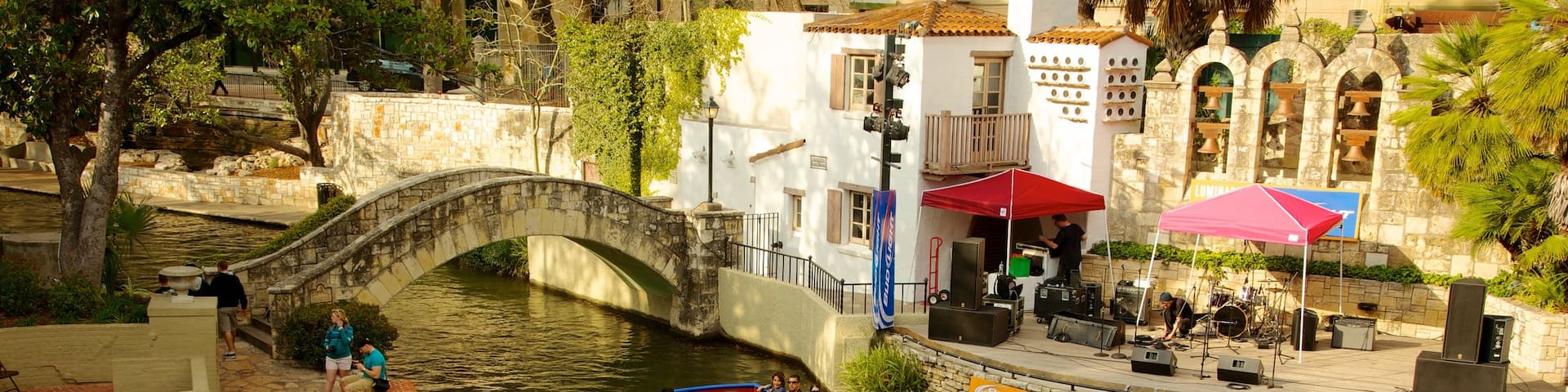 Downtown - Riverwalk featuring heritage architecture, boating and a bridge
