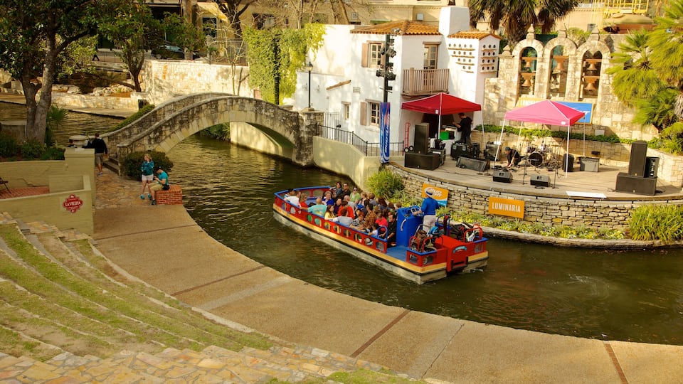 Downtown - Riverwalk showing a river or creek, a bridge and boating