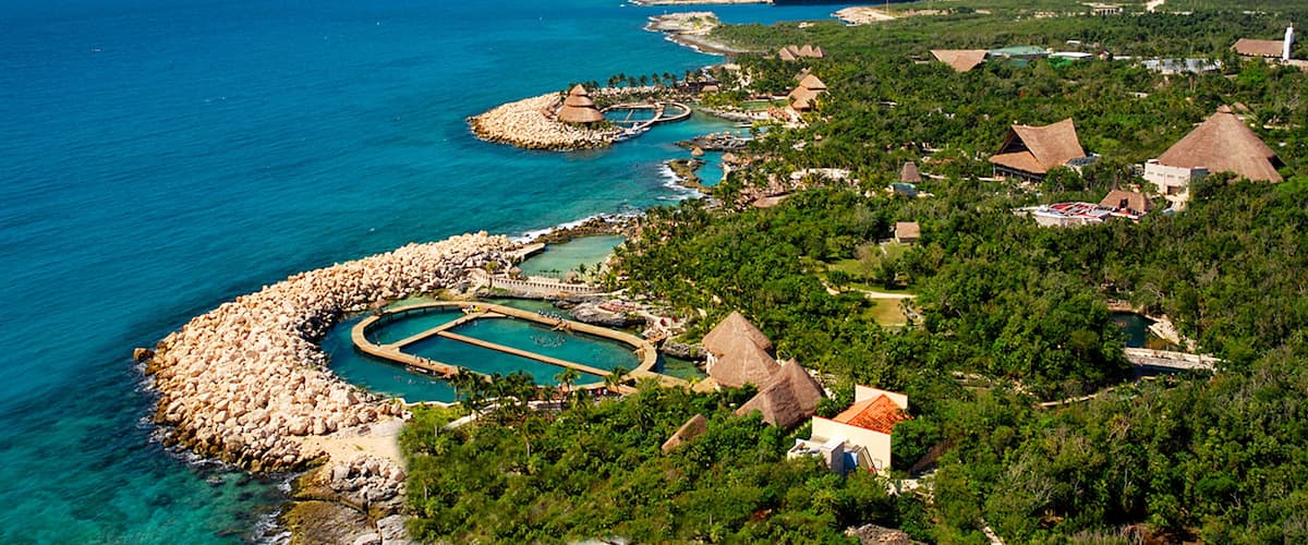 สวนสนุก Xcaret Eco แสดง ชายฝั่งทะเล, โรงแรมหรือรีสอร์ทหรู และ เมืองชายฝั่ง