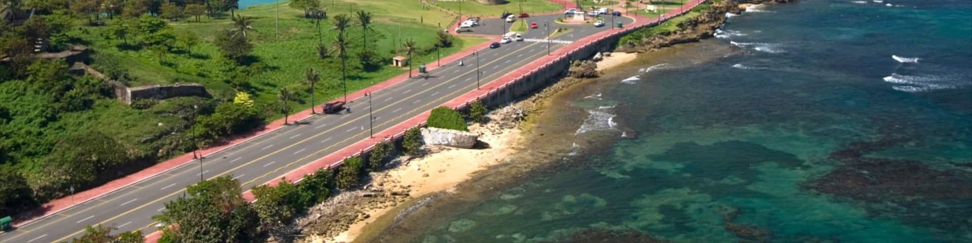 Dominican Republic featuring a coastal town, rocky coastline and general coastal views