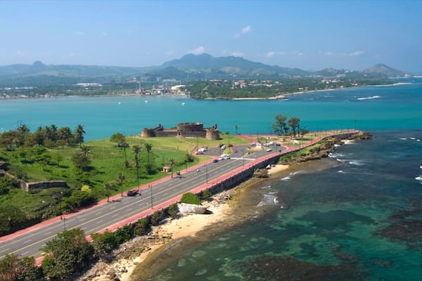 Dominican Republic which includes a bay or harbour, rocky coastline and general coastal views