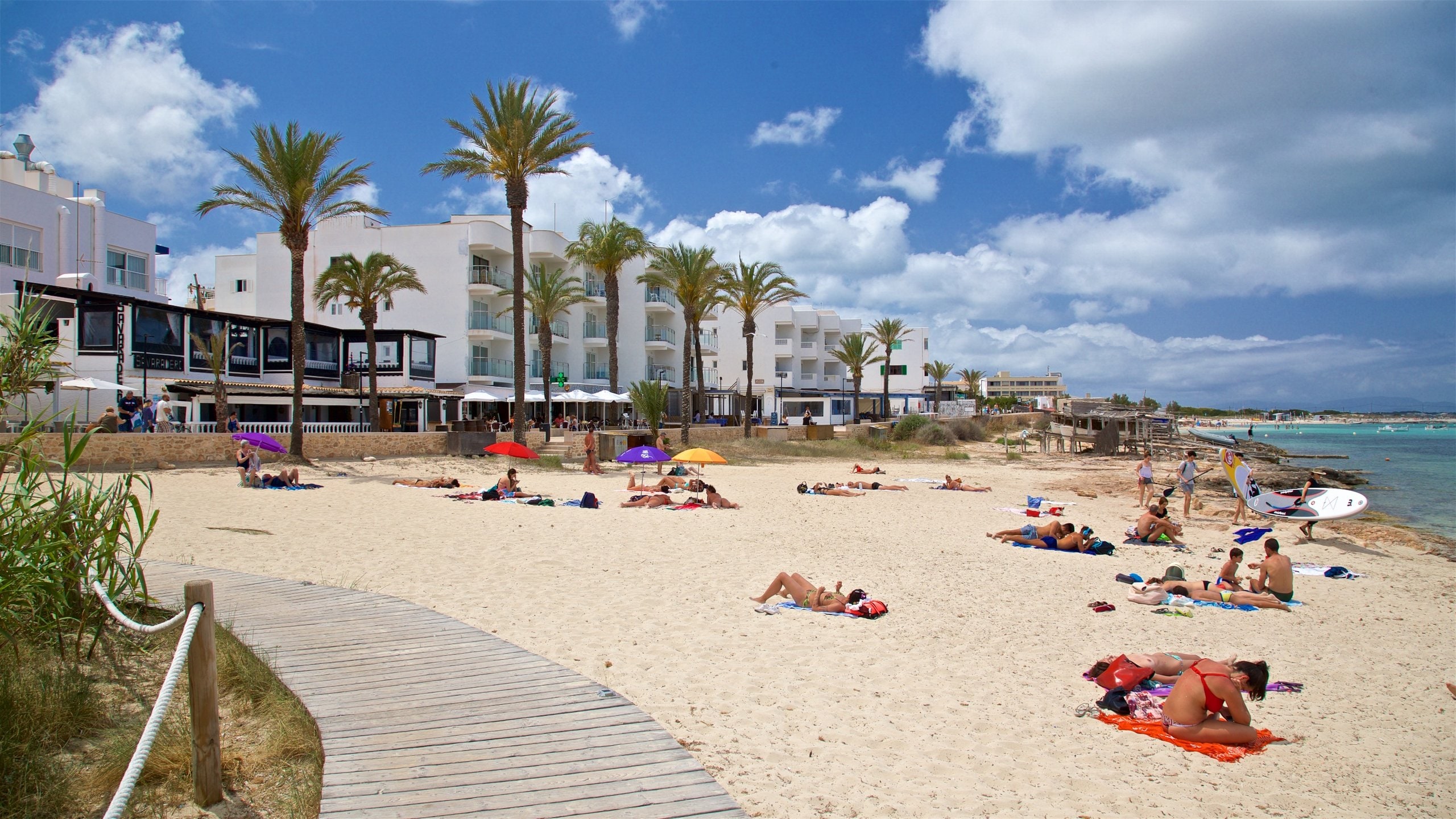 Es Pujols Beach which includes a beach, general coastal views and a coastal town
