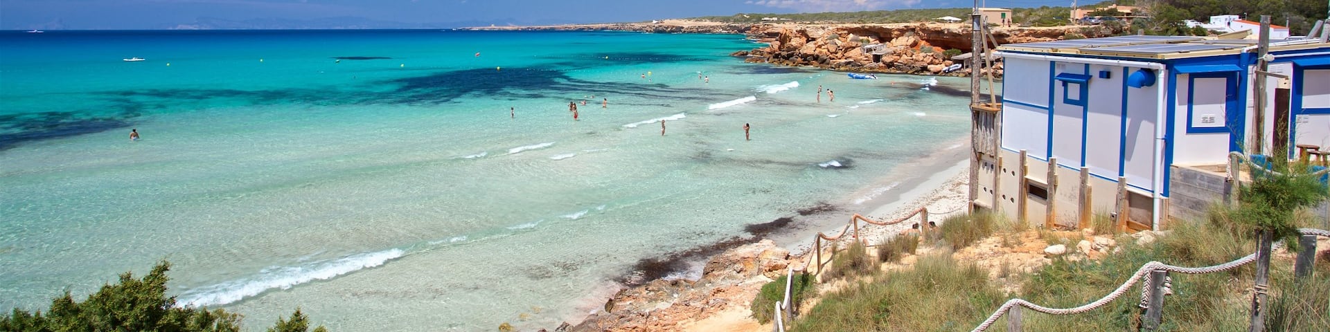 Cala Saona showing a beach and general coastal views
