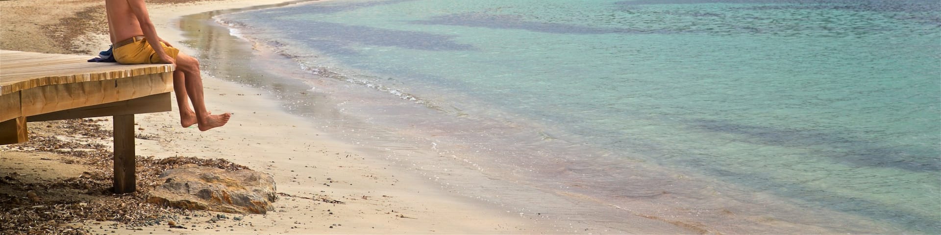 Talamanca Beach showing general coastal views, a beach and a coastal town