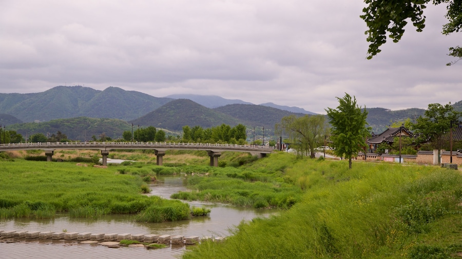 Gyeongju which includes tranquil scenes, a bridge and a river or creek