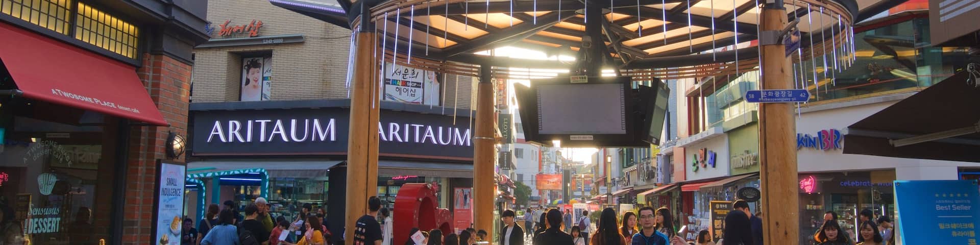 Andong which includes cbd and street scenes as well as a small group of people