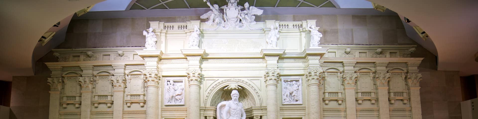 Lotte Department Store which includes a statue or sculpture, a fountain and heritage elements