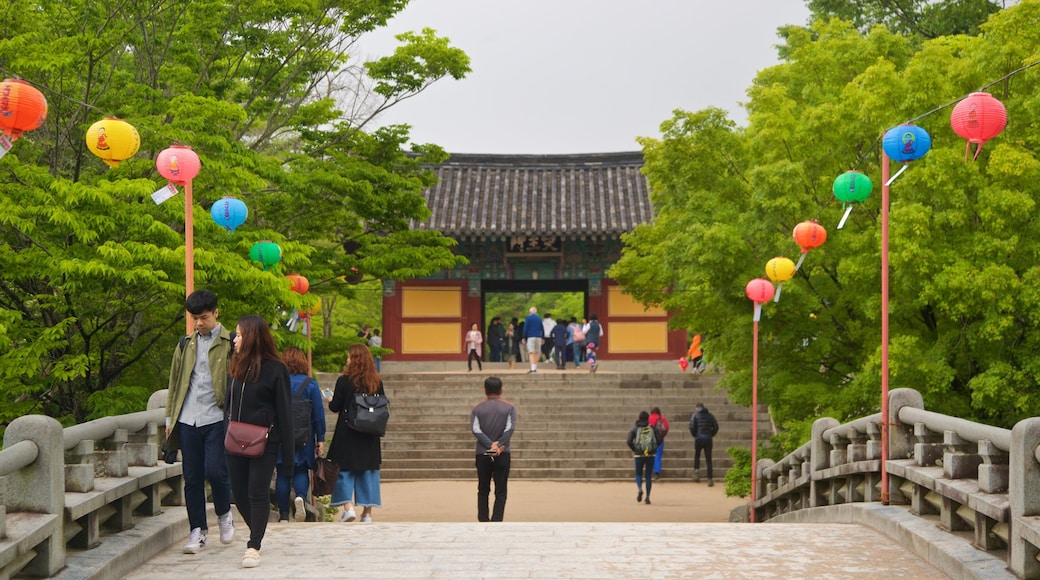 Bulguksa Temple featuring a bridge and a park as well as a couple