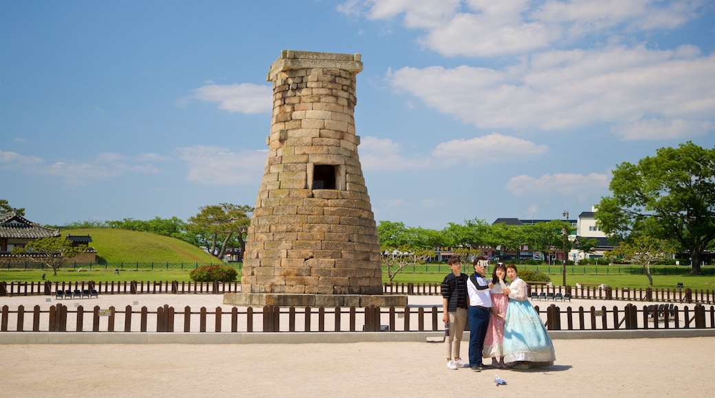 Cheomseongdae showing heritage elements as well as a small group of people