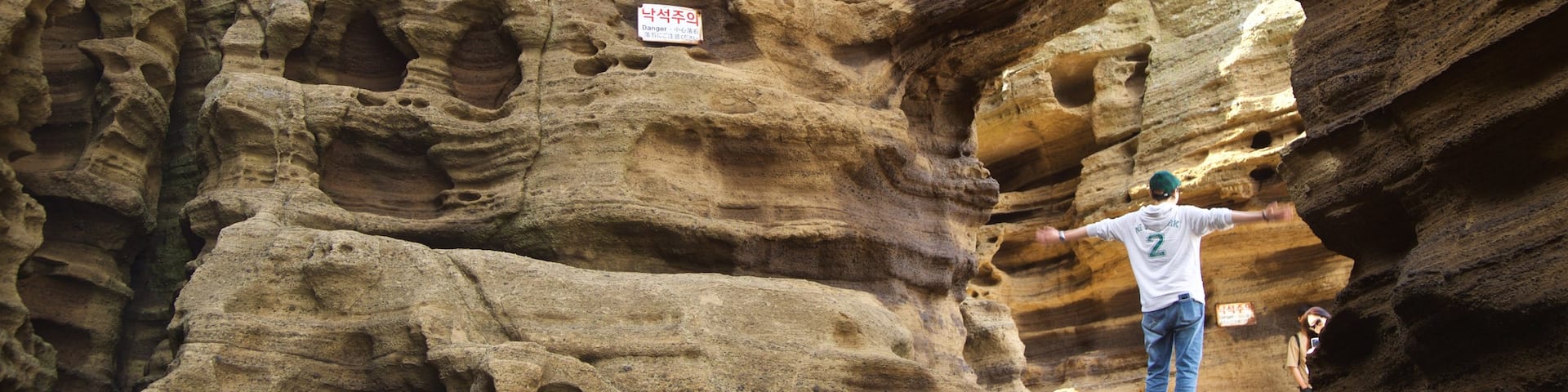 Yongmeori Coast showing rugged coastline as well as an individual male