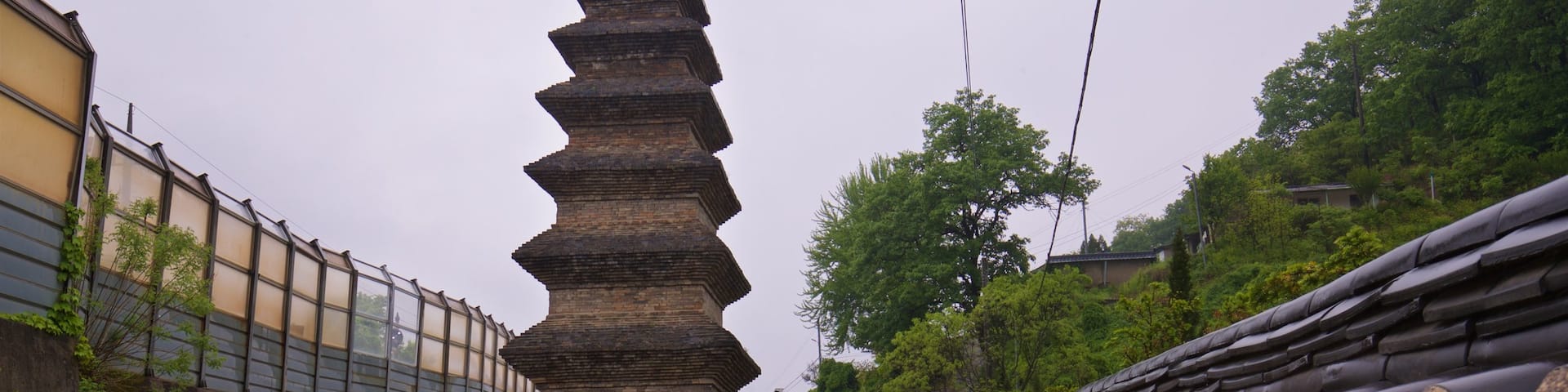 Seven-story Brick Pagoda in Sinse-dong which includes heritage elements and a monument as well as a small group of people