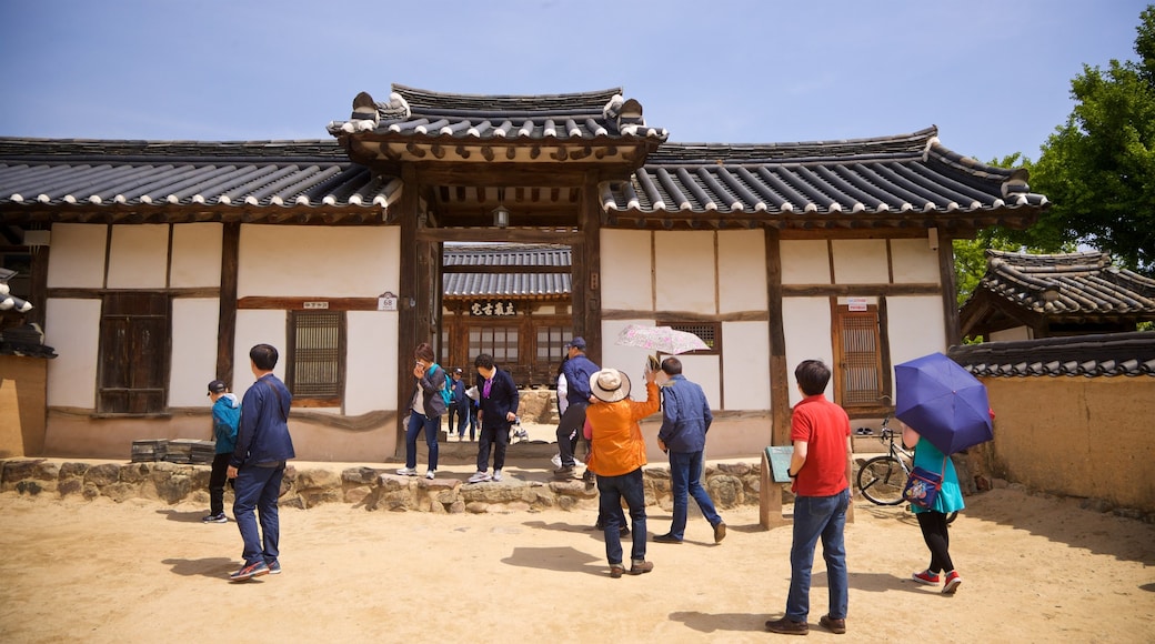 Andong Hahoe Folk Village which includes a small town or village and heritage elements as well as a small group of people