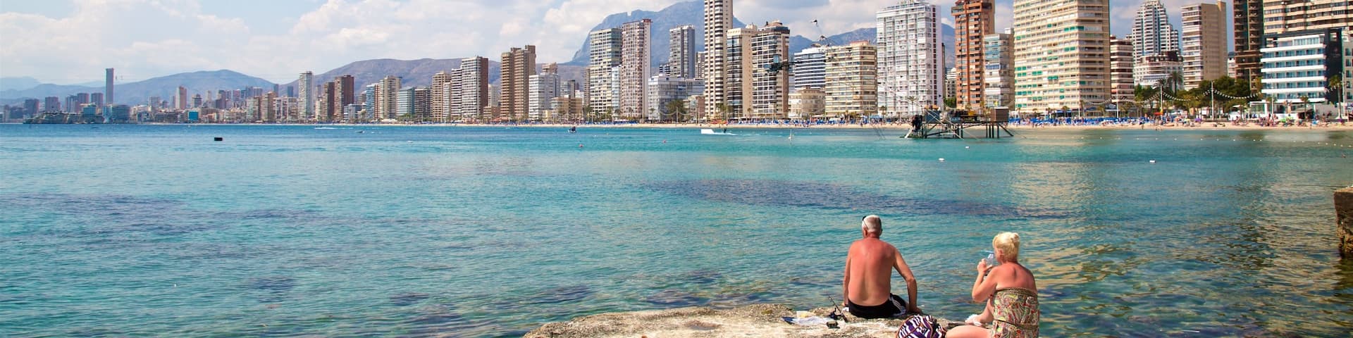 Levante Beach featuring general coastal views and a coastal town as well as a couple
