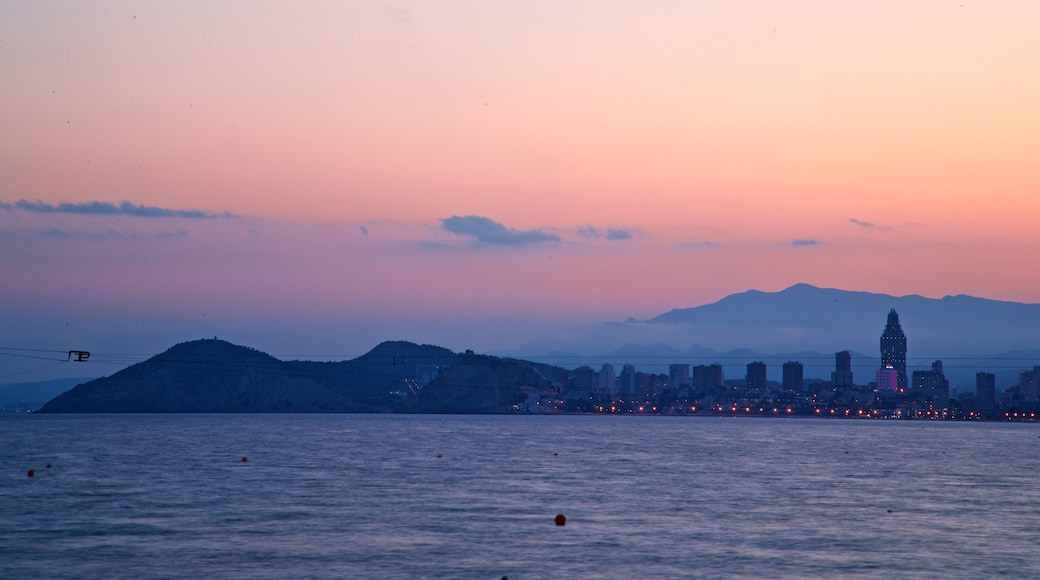 Benidorm showing a sunset and general coastal views