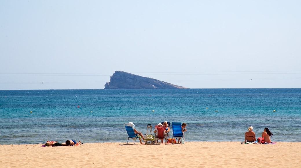 Levante Beach showing general coastal views and a sandy beach as well as a small group of people