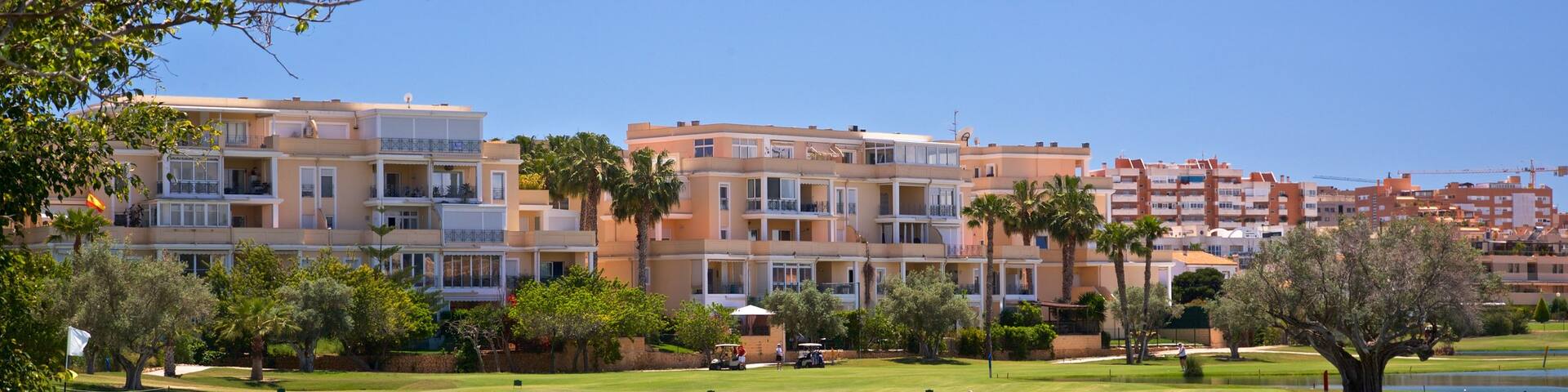 Alicante Golf Course featuring golf and a lake or waterhole