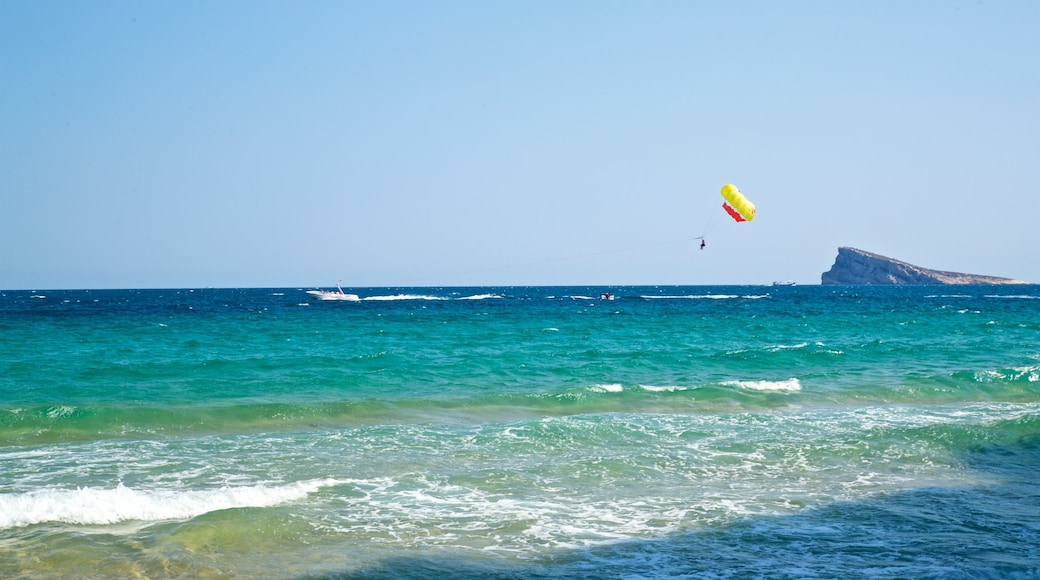 Levante Beach which includes general coastal views and parachuting