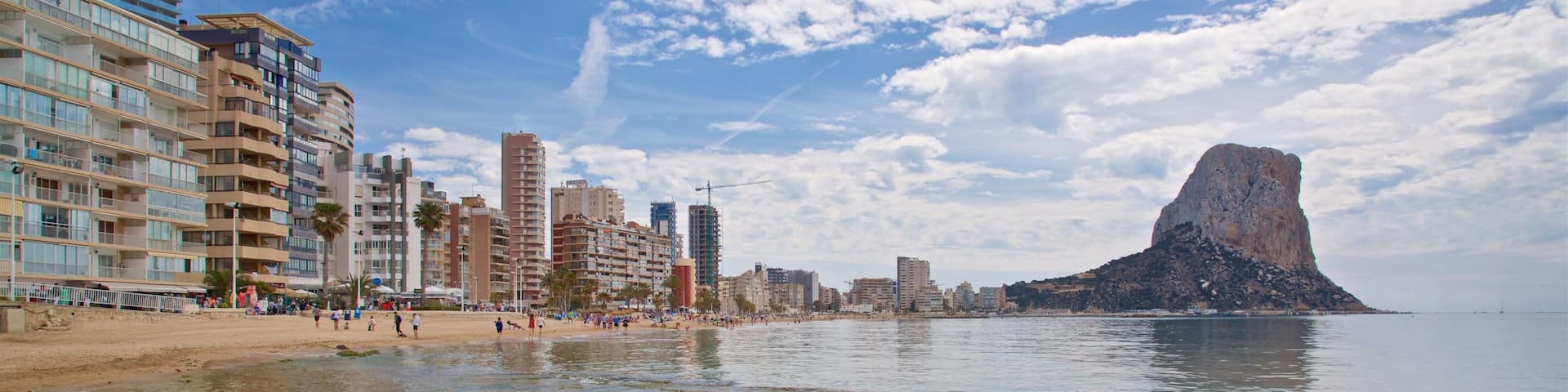 Arenal-Bol Beach which includes rocky coastline and general coastal views