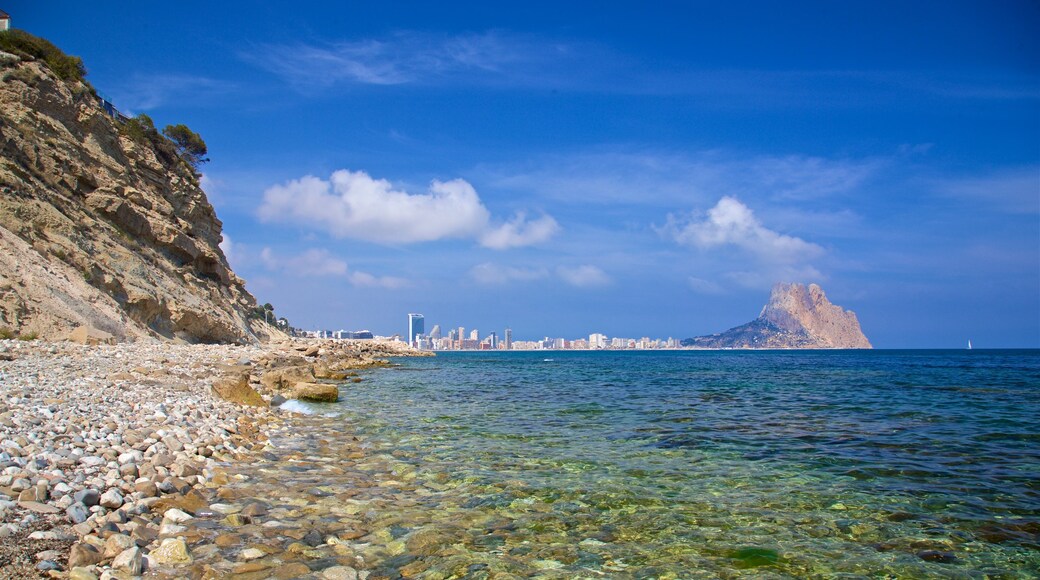 Cala Les Urques which includes general coastal views and a pebble beach