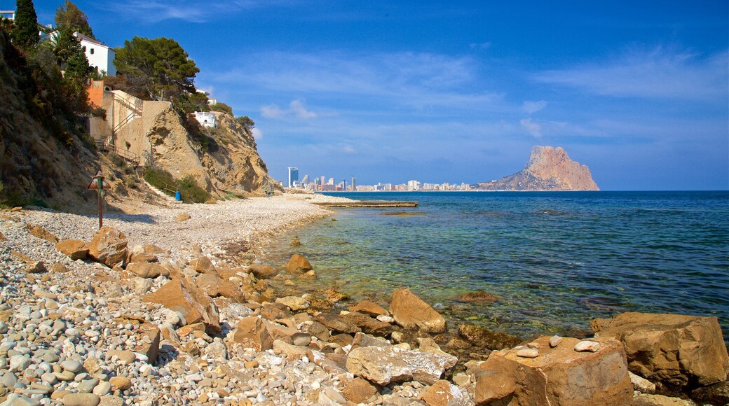 Cala Les Urques featuring a pebble beach and general coastal views