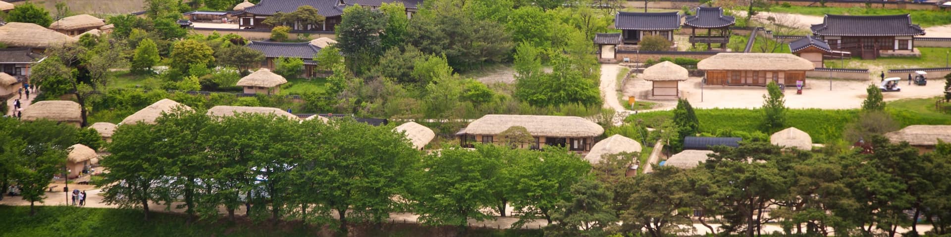 Buyongdae Cliff showing landscape views and a small town or village