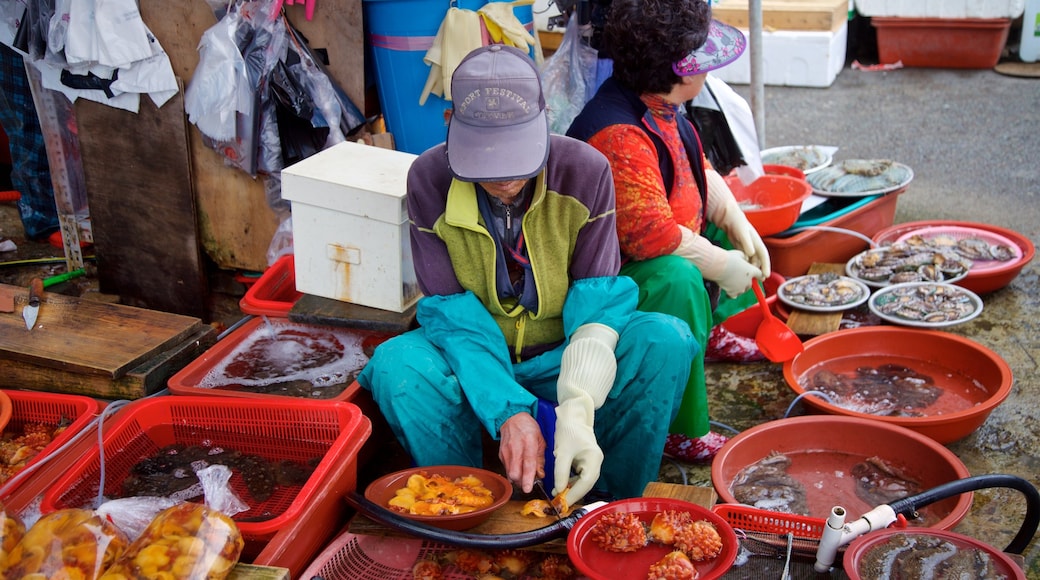 Tongyeong which includes markets as well as an individual male