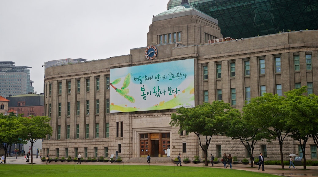 Seoul City Hall featuring signage and heritage architecture