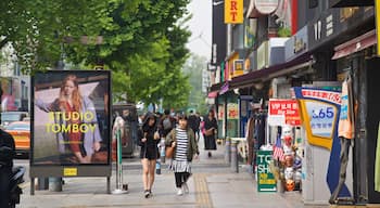 Itaewon which includes street scenes as well as a couple