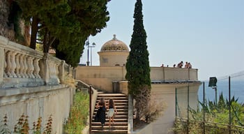 Castle Park showing general coastal views and views as well as a couple