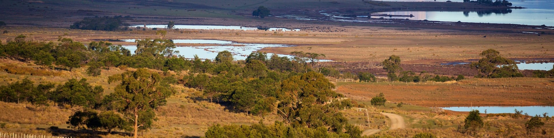 Devil’s Corner Cellar Door which includes tranquil scenes, a river or creek and landscape views