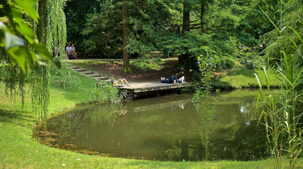 Botanical Gardens featuring a lake or waterhole and a garden