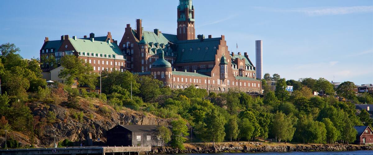 Vaxholm featuring a lake or waterhole and heritage architecture