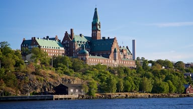 Vaxholm featuring a lake or waterhole and heritage architecture